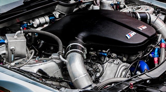 car hood up reveals engine