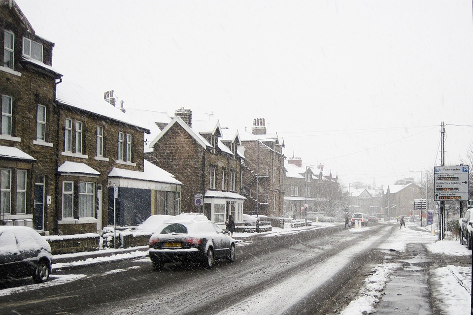 black and white picture of road in winter