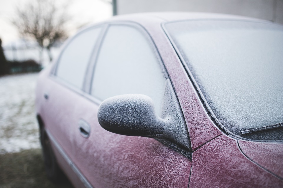 frost on red car