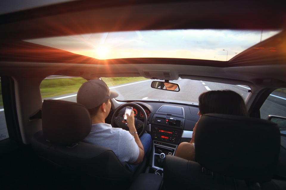 couple driving in car