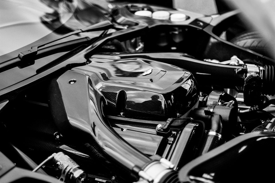 Close-up of a car engine bay, high-performance engine, automotive engineering, vehicle engine components