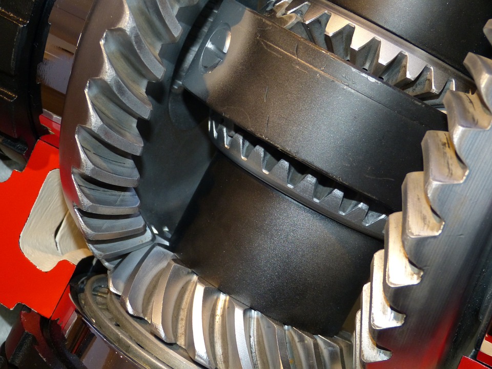 Close-up of an industrial mechanical gear mechanism, showcasing precision gear components and engineering