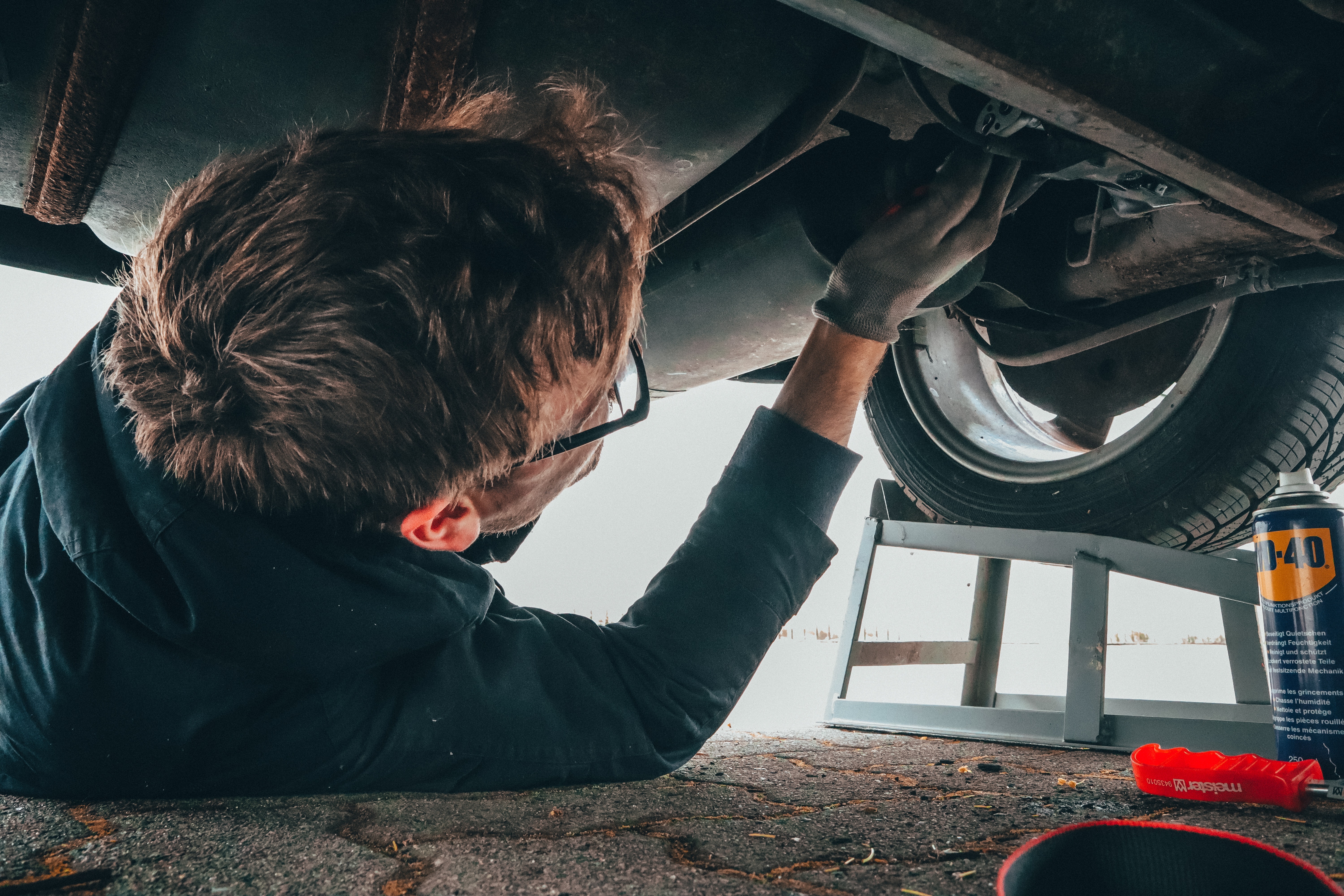 mechanic installs freeze plugs