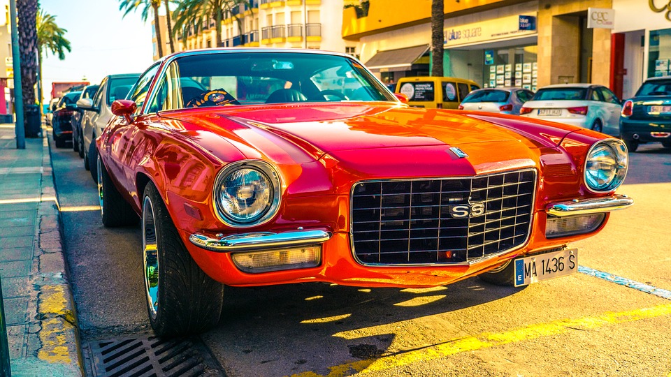 parked red muscle car